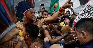 কপ-থার্টি সম্মেলনের প্রবেশপথে আদিবাসীদের বিক্ষোভ; জলবায়ুর বিরুদ্ধে অবস্থান ট্রাম্পের